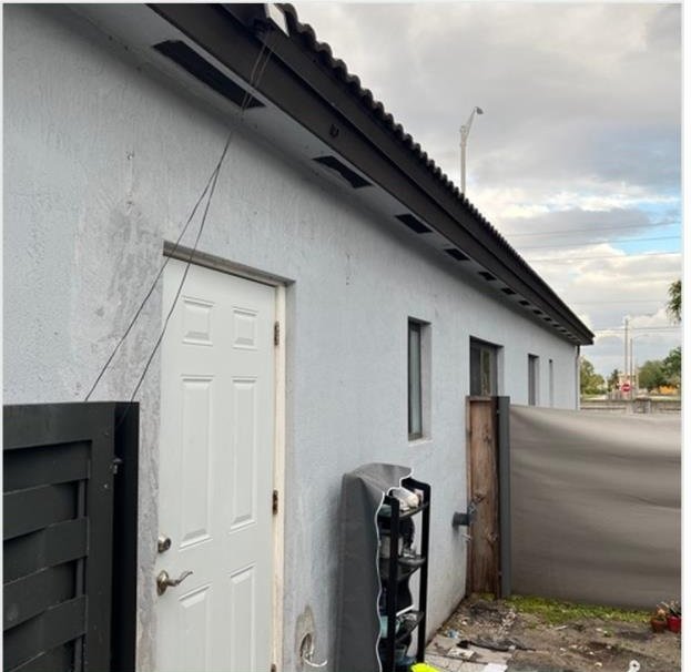 Residential exterior wall before awning installation