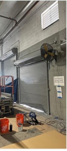 Loading-dock door painting in progress